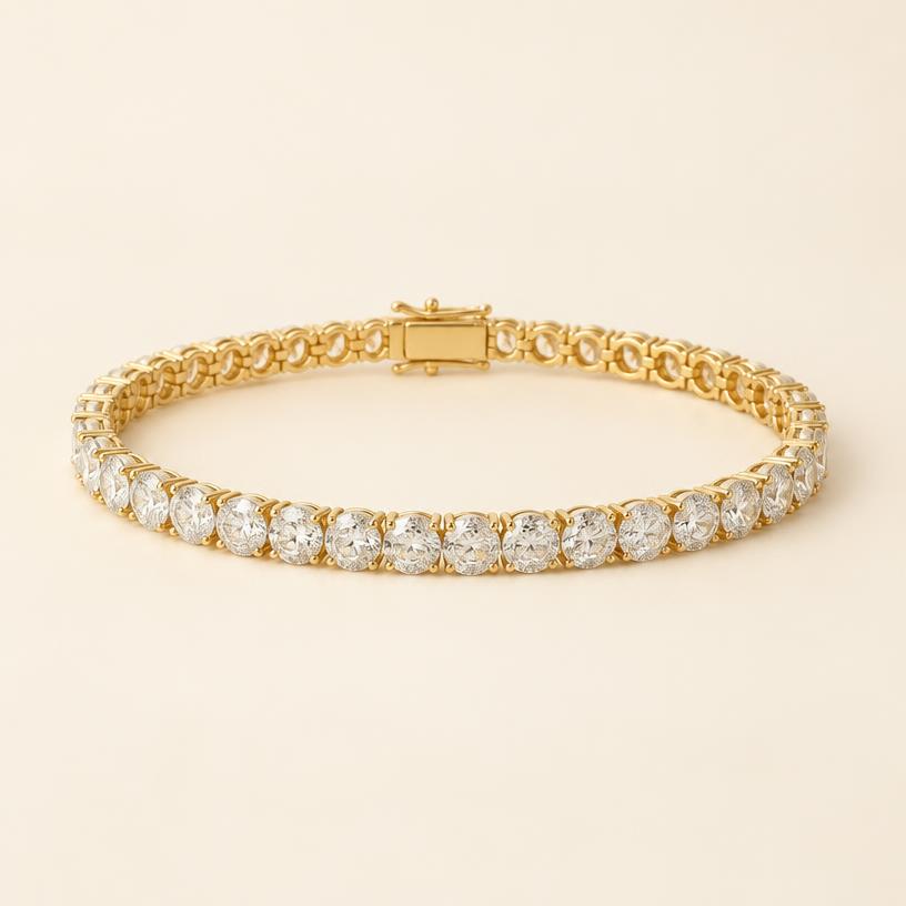 Full piece of the yellow gold tennis bracelet with larger round stones