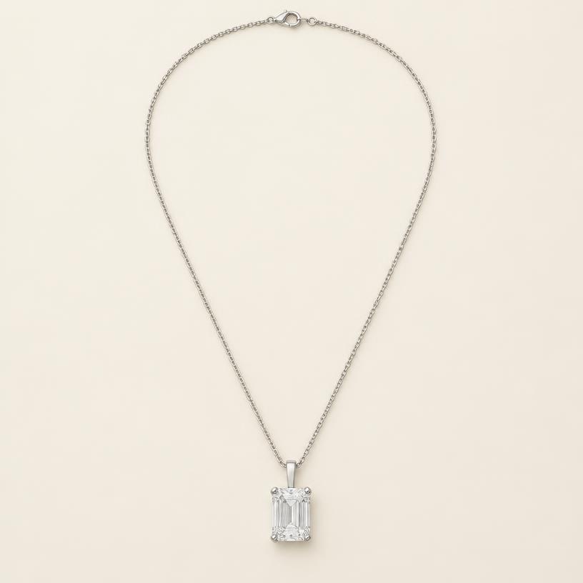 Full piece of the white gold emerald-cut pendant necklace