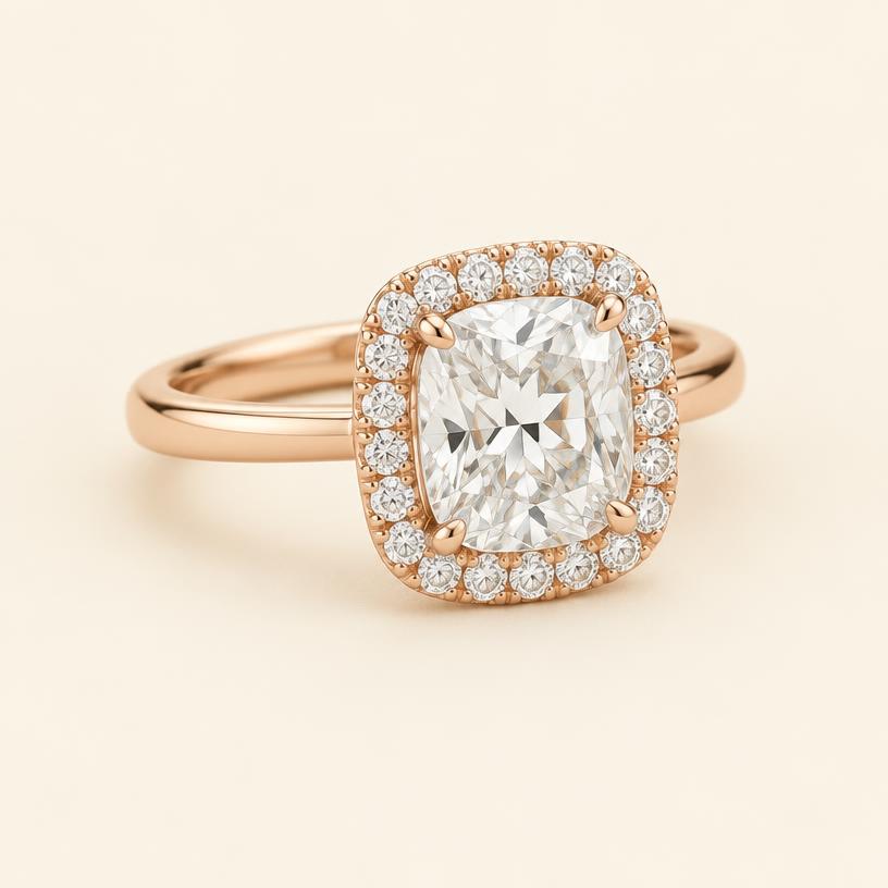 Three-quarter view of the rose gold cushion halo ring